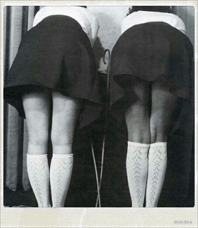 Girls-bend over-traditional-British school uniform- white knee socks